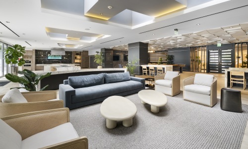 seating area around small tables in a large resident lounge