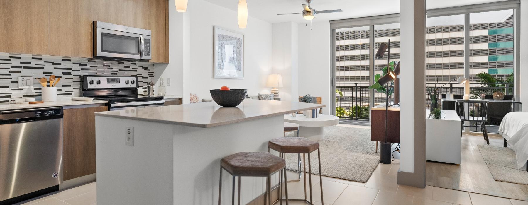 a kitchen with bar stools