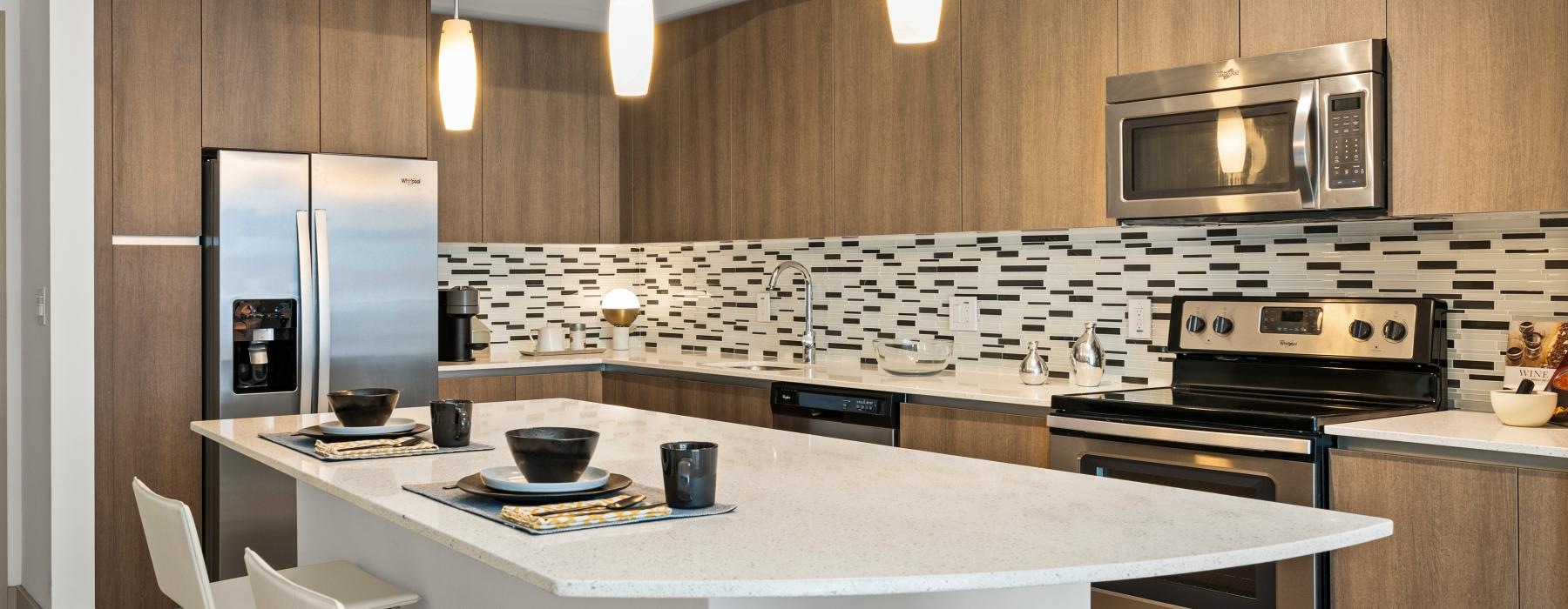 a kitchen with a table and chairs